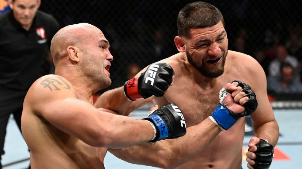 Nick Diaz “Bar Brawl” vs. Robbie Lawler and gives up the match for a strange reason in return after 6 years;  paying off